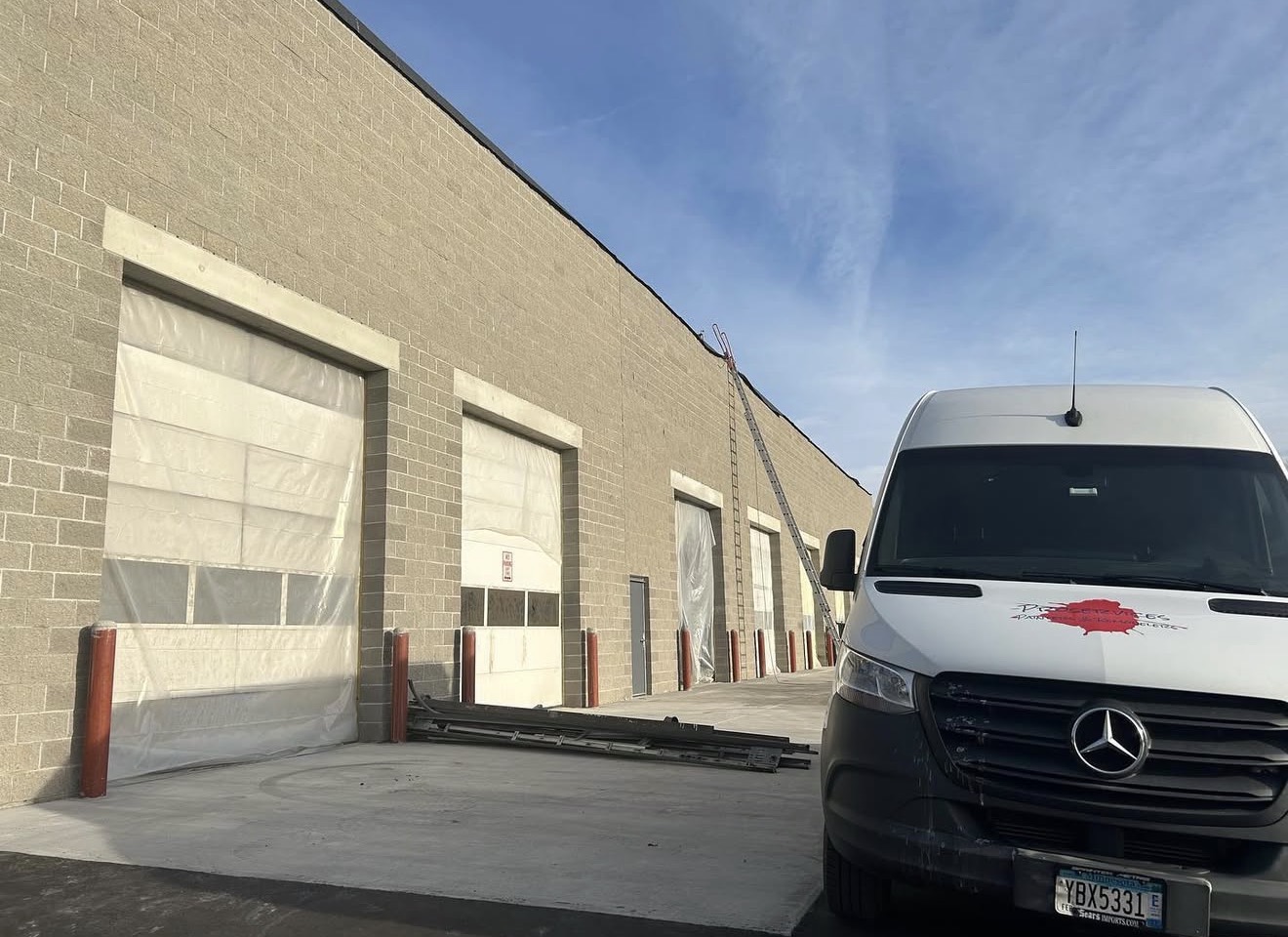 Commercial Building Exterior with Van