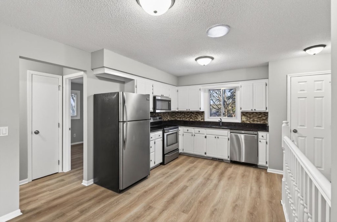Kitchen with White Cabinets